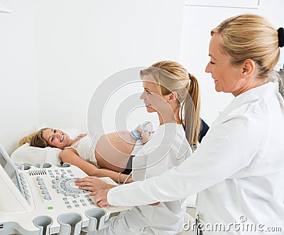 Pregnant Woman Getting Ultrasound Examination