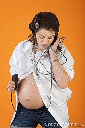 Pregnant Woman With Music