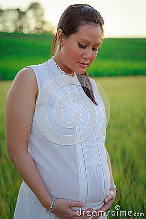 Pregnant woman outdoors