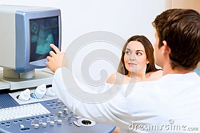 Pregnant woman on reception at the doctor