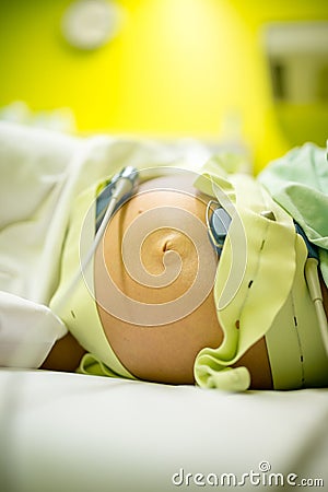 Pregnant woman undergoing prenatal tests