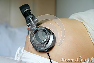 Pregnant women listen music