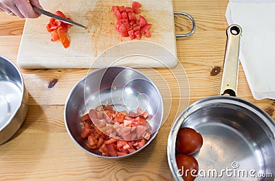Preparing tomatoes.