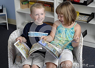 Preschool children read books