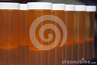 Prescription bottle black background in a line side angle