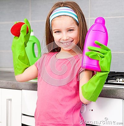 Little girl washing the dishes