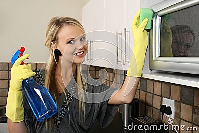 Pretty Woman Cleaning Kitchen