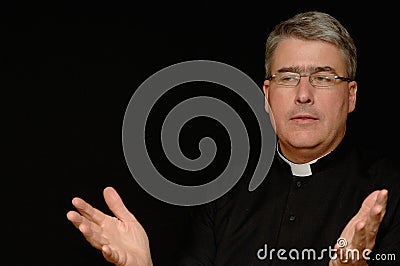Priest with hands outstretched