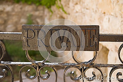 Private sign on railing