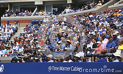 Professional photographers and spectators during US Open 2013 at the Arthur Ashe Stadium