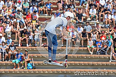 A professional rider at the Scooter Pak competition on the Central Park at LKXA Extreme Sports Barcelona Games