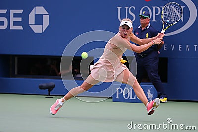 Professional tennis player Caroline Wozniacki celebrates victory after third round match at US Open 2014