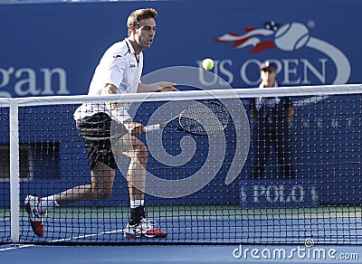 Professional tennis player Marcel Granollers during fourth round match at US Open 2013 against Novak Djokovic
