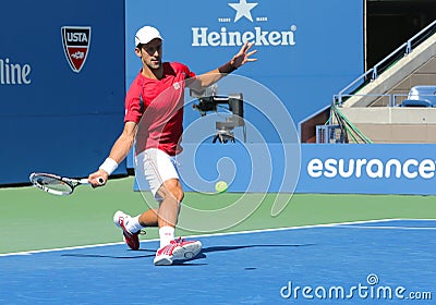 Professional tennis player Novak Djokovic practices for US Open 2013