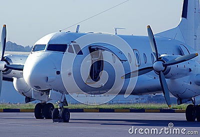 Propeller passenger airplane on runway