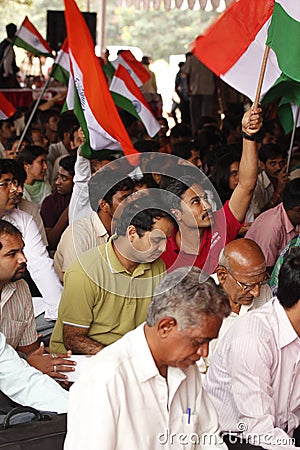 Protester waving indian flag