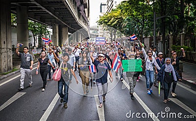 Protesters walking on the road