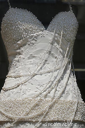 Pure white wedding gown with pearls