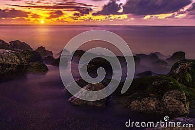 Purple Sunset over Sea Shore