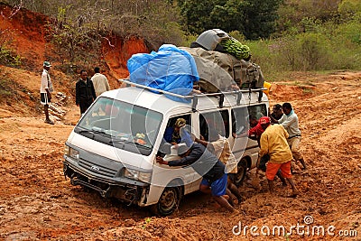 Pushing the car out of mud