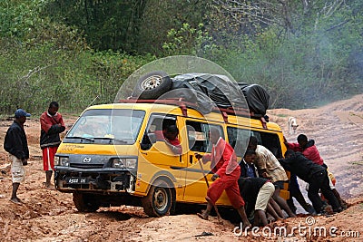 Pushing the car out of mud