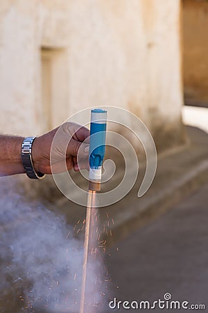 Pyrotechnic firing a rocket