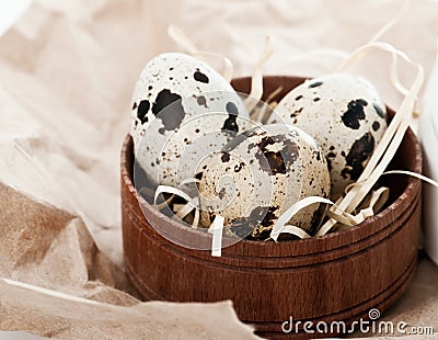 Quail eggs in wooden box