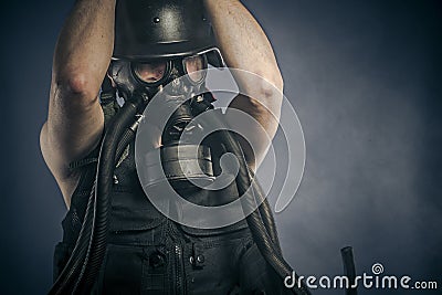 Radiation, nuclear disaster, man with gas mask, protection