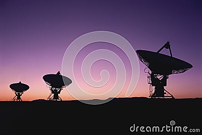 Radio telescope dish field in twilight