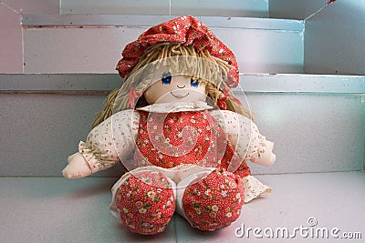 Rag doll in red dress