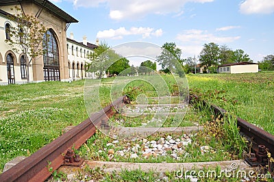 Rail station and railway