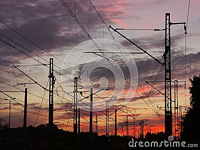 Railway infrastructure against the sunset sky