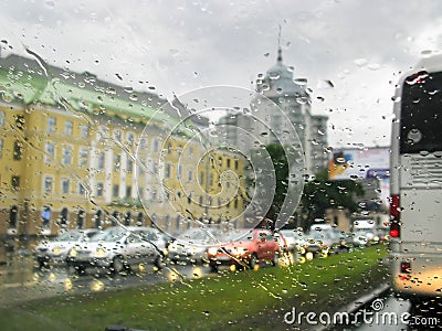 Rain in city, traffic, cars, lights, drops