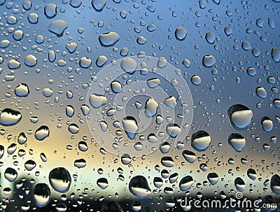Rain drops on the window, sunset in background #2