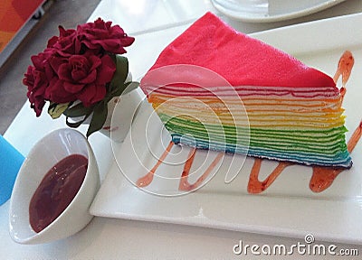 Rainbow crepe cake with strawberry jam