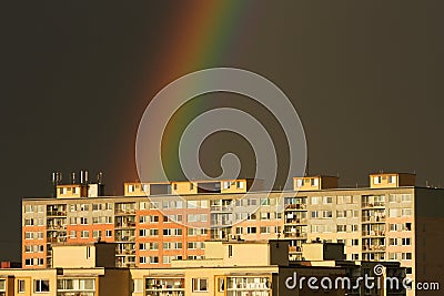 Rainbow over settlement