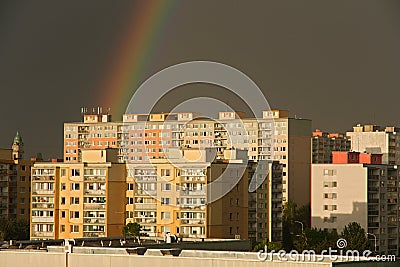 Rainbow over settlement