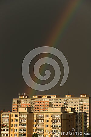 Rainbow over settlement