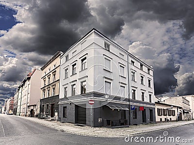 Rainy sky over street corner in Chelmno, Poland.