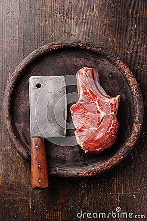 Raw meat and meat cleaver