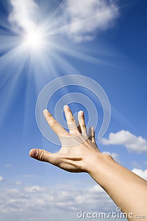 reaching-sun-13337392.jpg