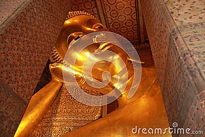 Reclining Buddha gold statue face, Thailand