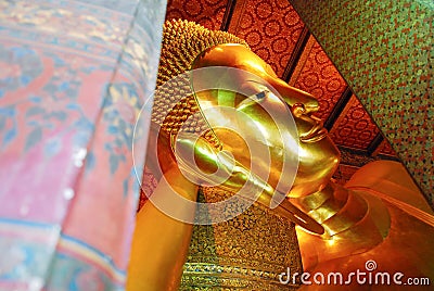 Reclining Buddha gold statue face