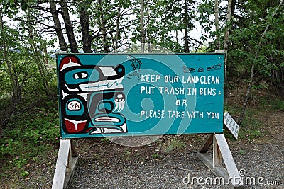 A recreational area s painted trash sign.
