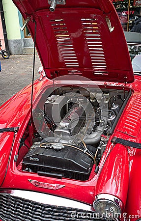 Red antique Austi Healey 300 - open car engine