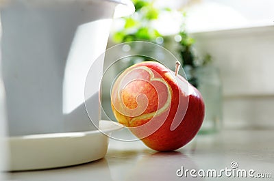 Red apple with heart