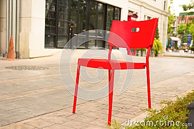 Red chair in the park thailand
