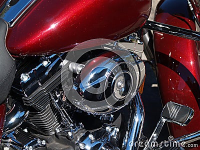 Red and chrome closeup detail of motorcycle