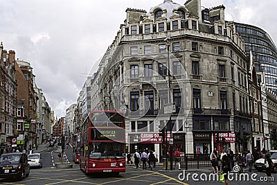 Red english bus in traffic