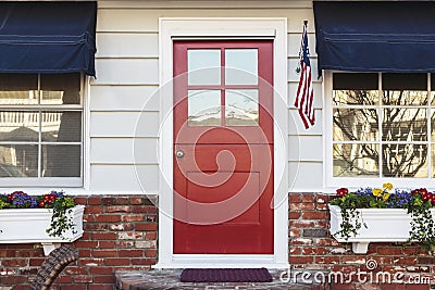 Red front door of an american home